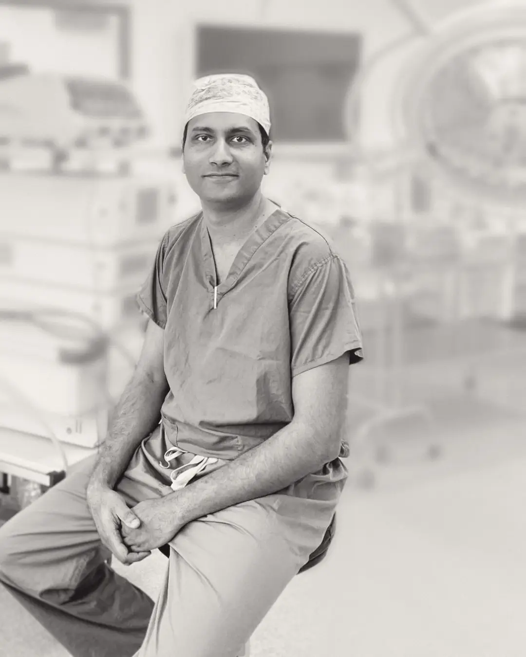 Mr Siva Kumar Veeramani, Consultant Plastic Surgeon, in the operating theatre